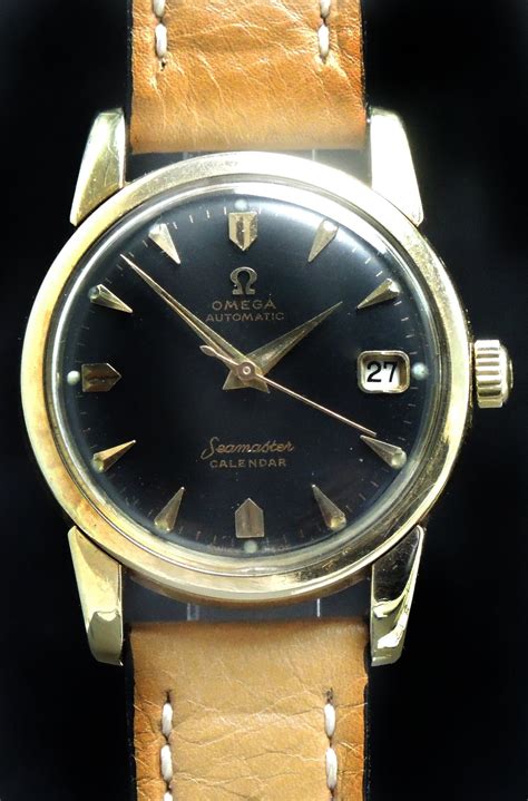 omega automatic seamaster calendar gold|omega seamaster calendar automatic.